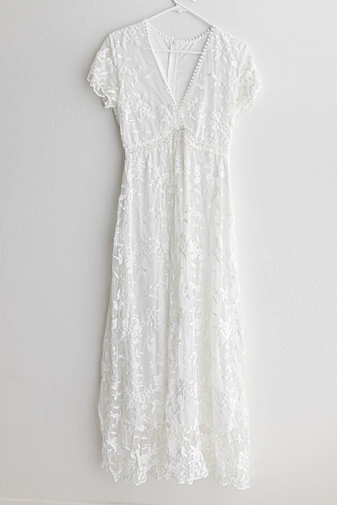 White lace cap sleeve V-neck maxi dress for moms or maternity photoshoot in Menifee California.
