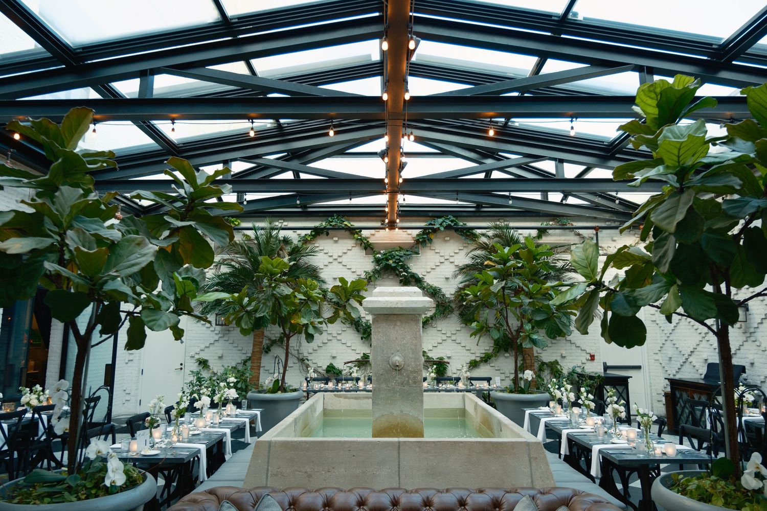 Chic garden-inspired rehearsal dinner at Oxford Exchange Tampa with natural light and greenery