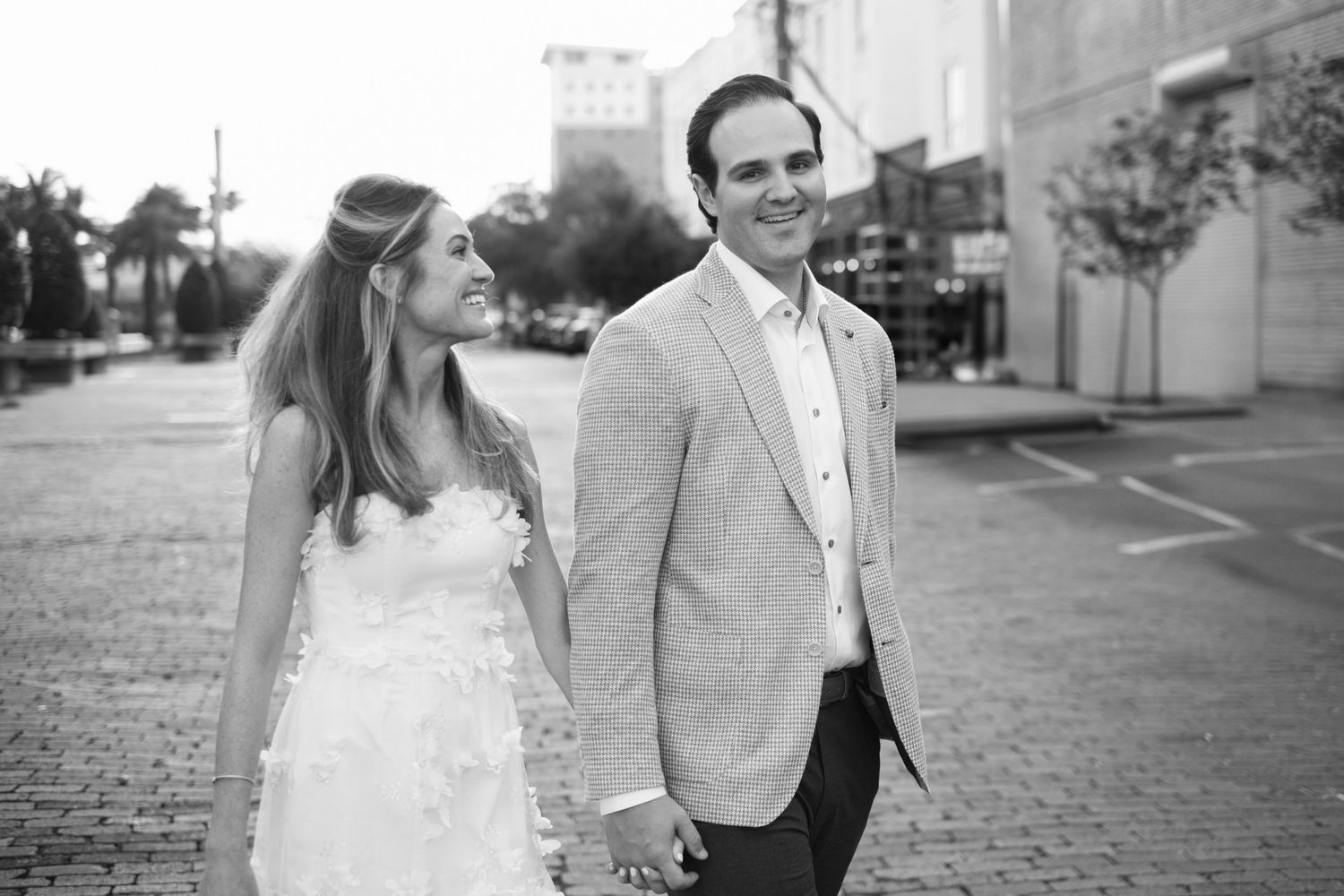 Couple hosting a stylish rehearsal dinner at Oxford Exchange wedding venue in Tampa Florida