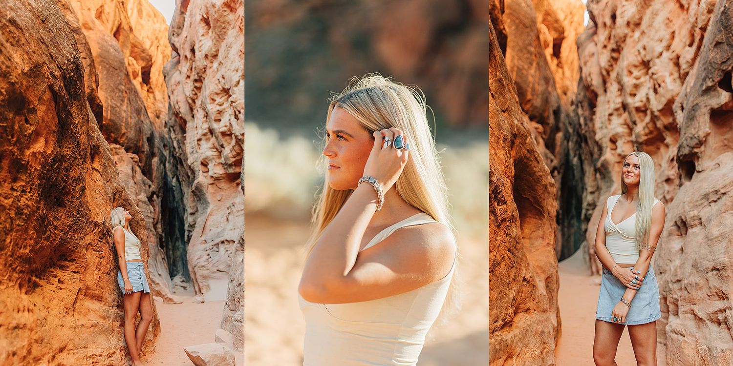 Young blonde woman in white top and blue shorts posing in a scenic red rock canyon for a portrait session.