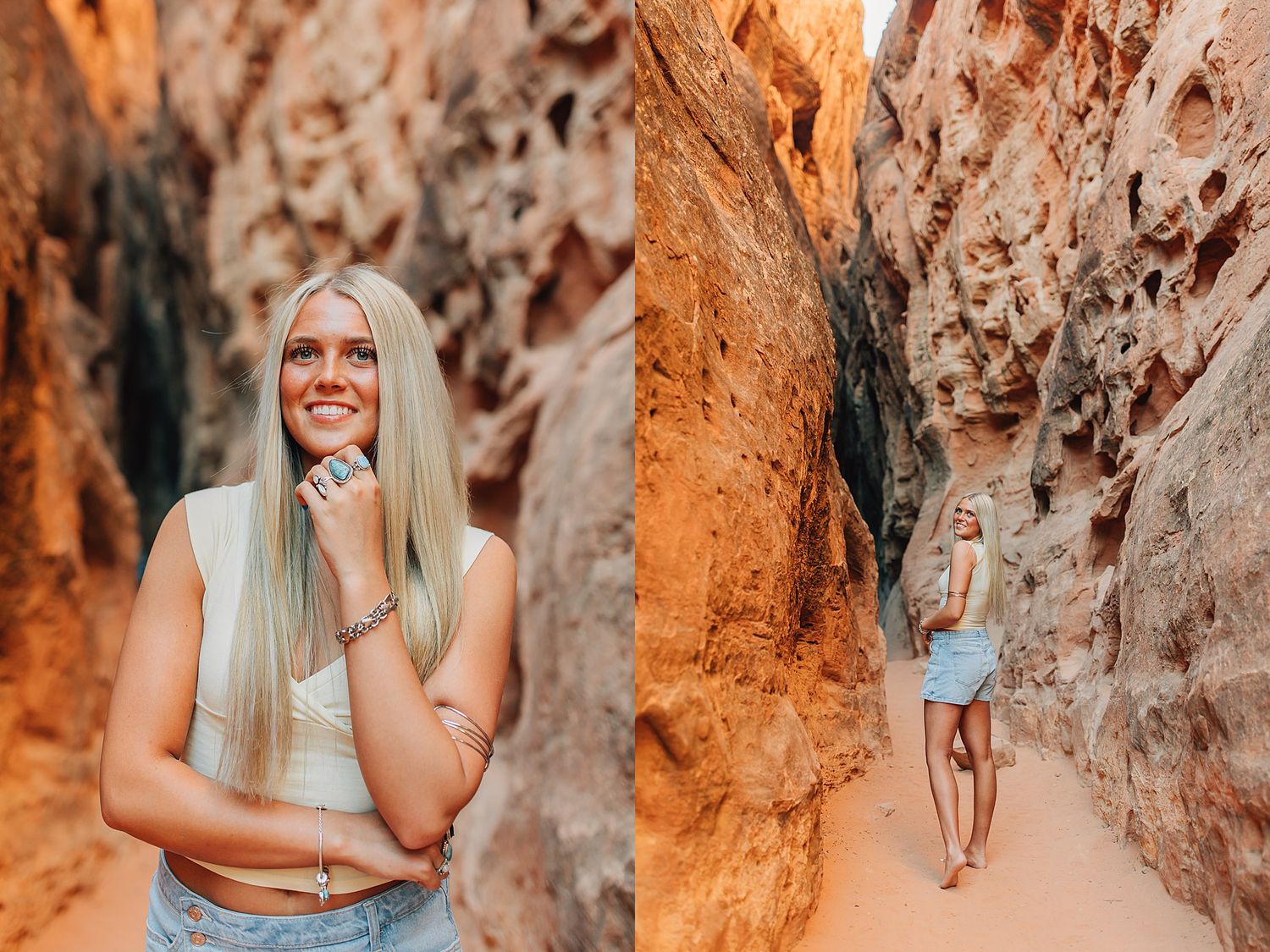 Young blonde woman smiling in a red rock canyon slot, wearing a white top and denim shorts in a desert landscape.