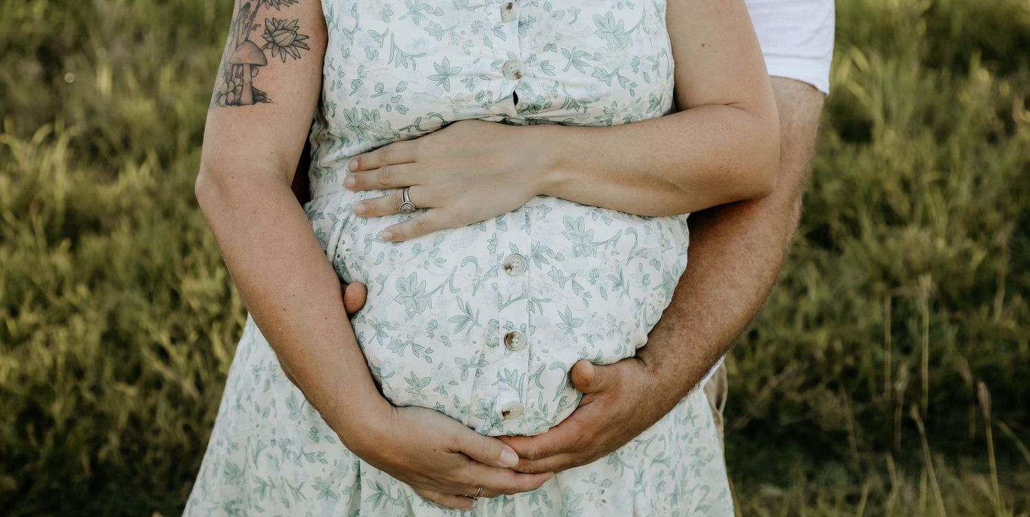 Mummy and Daddy holding you tight.