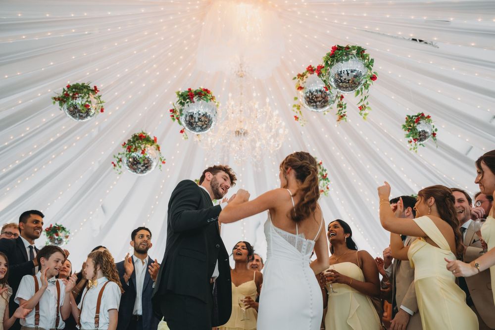 Bride and groom dancing at their wedding reception at Herrington on the Bay