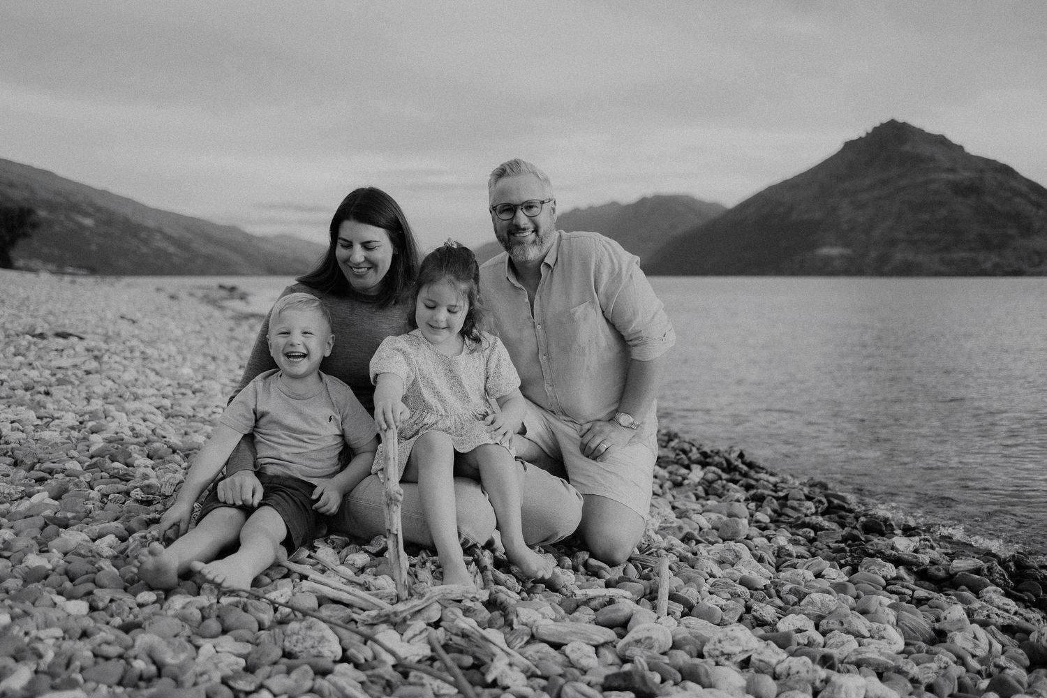 photo of extended family all running towards the camera in a field