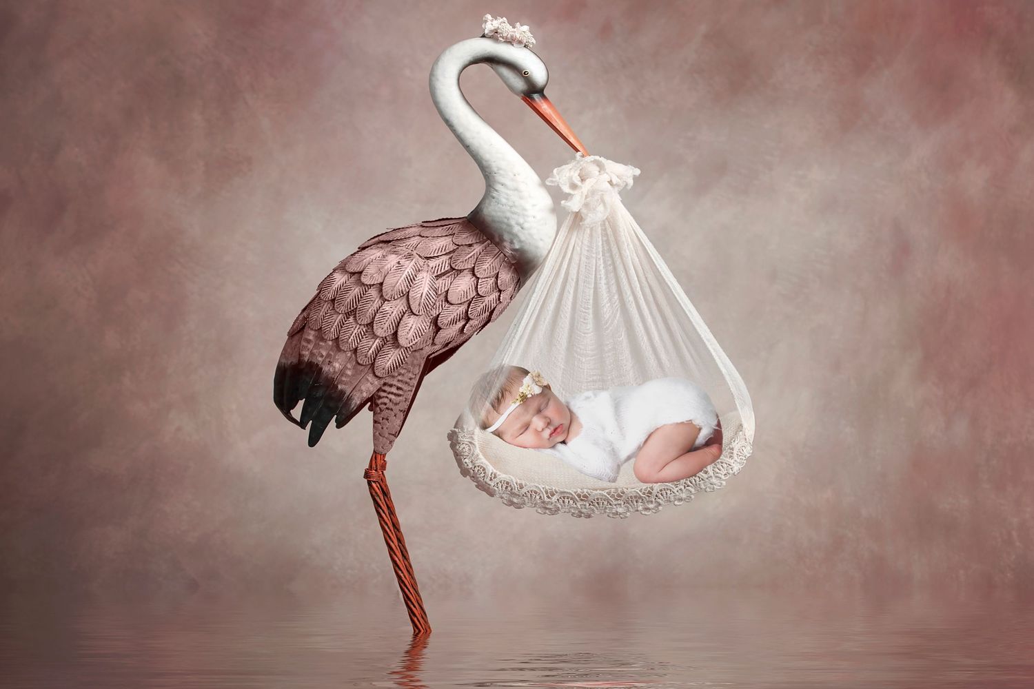 A stork stands elegantly holding a white bundle containing a sleeping baby in a dreamy artistic portrait.