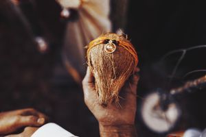 Close-up details of traditional Indian wedding jewelry and accessories.