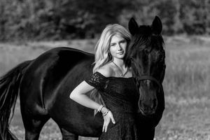 A group of black and white photos featuring various portraits of a person posing with a dark-colored horse outdoors.