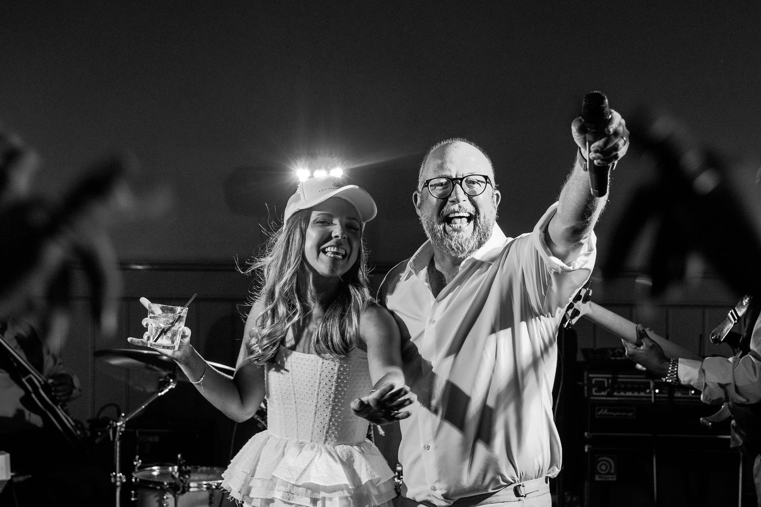 shot of two little girls dancing at a wedding reception