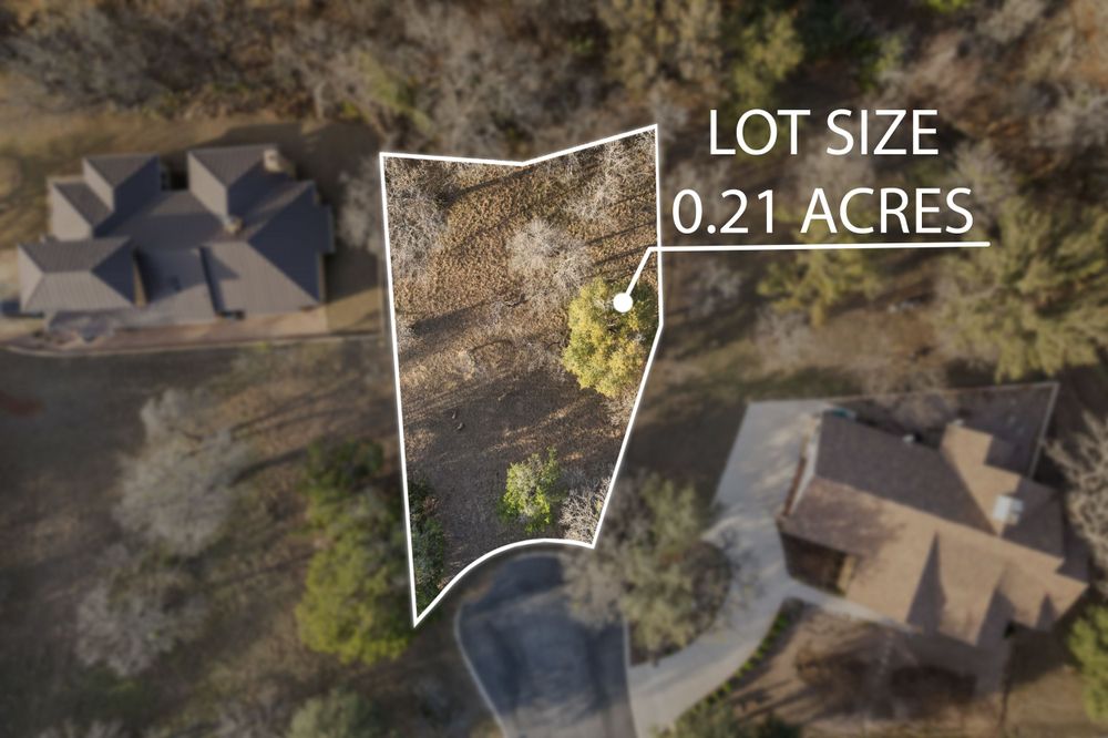 Aerial view showing lot boundaries of a 0.21 acre residential property plot.