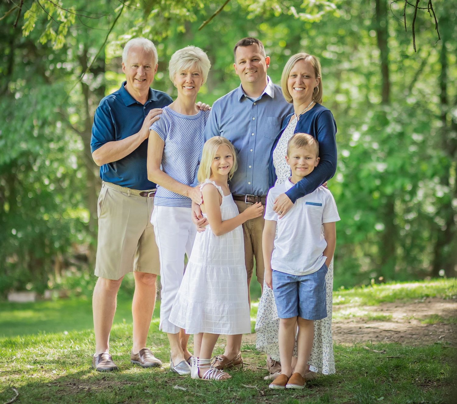 colorful and bright family photo including grandparents