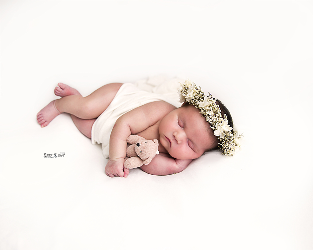 sleepy newborn baby posed in professional photography studio, melbourne east, croydon