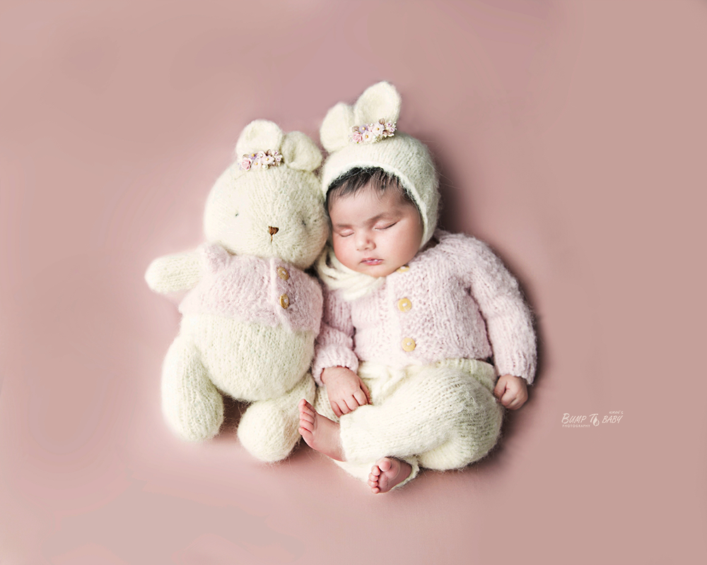 Tiny newborn baby sleeping next to teddy bear in Croydon Melbourne studio session
