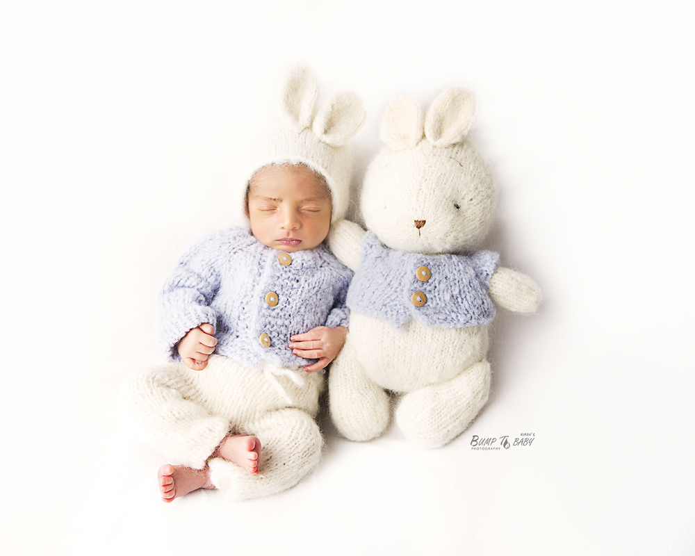Newborn baby sleeping with teddy in Melbourne studio
