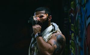 Expression-focused shot of athlete under neon light