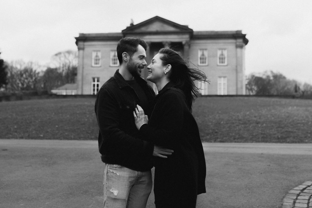 A romantic vintage black and white photo sequence showing a couple embracing and kissing in an outdoor setting. Roundhay Park Leeds.