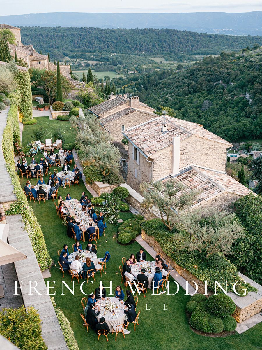 Elegant outdoor wedding dinner at La Bastide in Gordes, Provence, featured in French Wedding Style magazine.