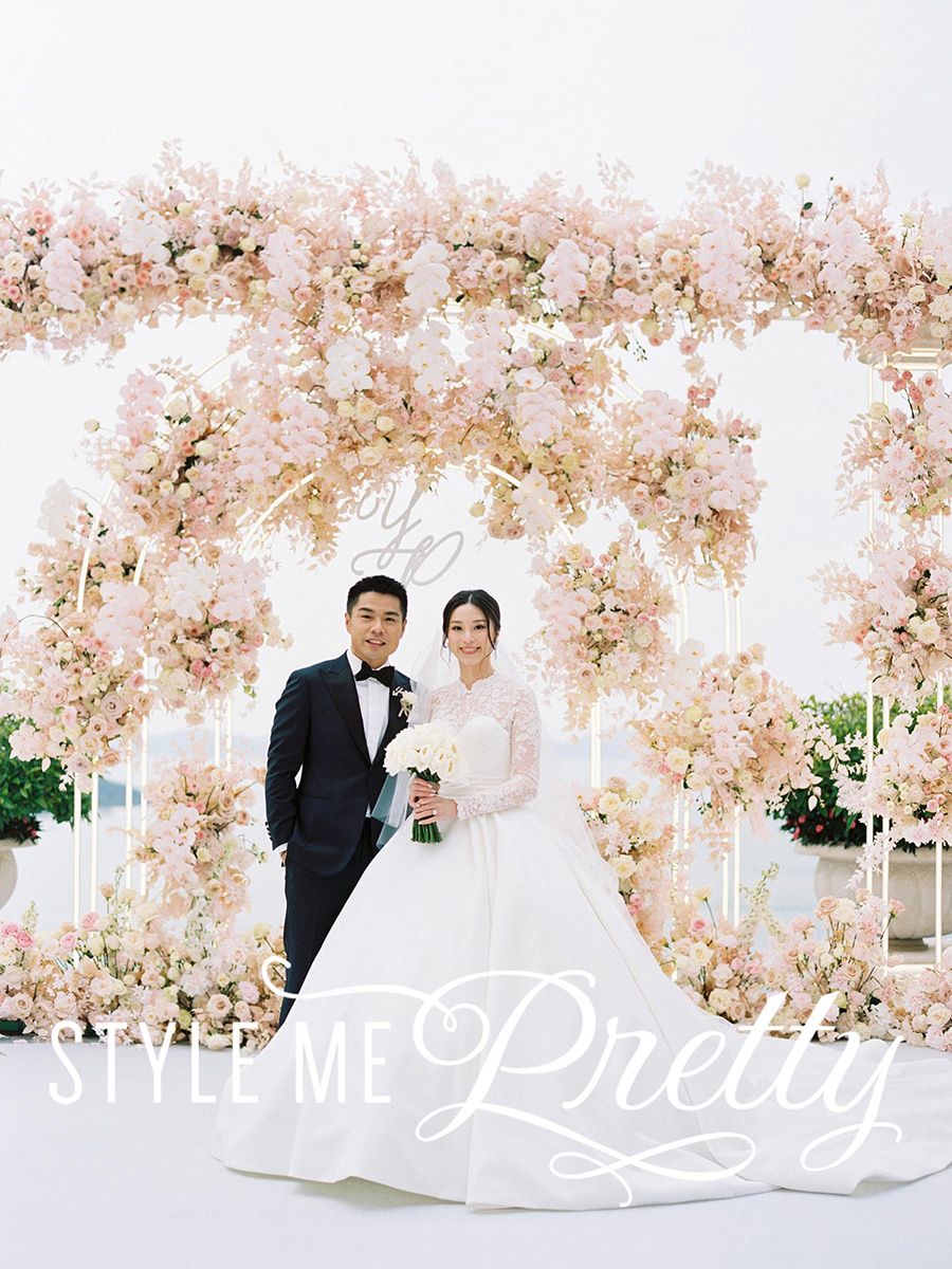 Elegant Hong Kong wedding with floral arch, featured in Style Me Pretty magazine, captured by fine art photographer Stepan Vrzala.