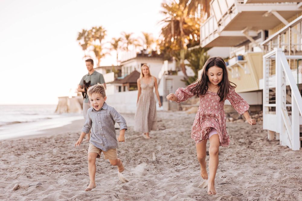 Family walking together along a beach at sunset, holding hands and laughing in a series of connected photos.