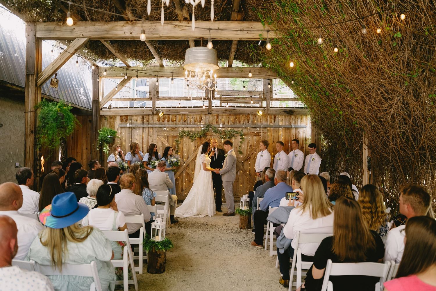 Intimate wedding photo of couple in elegant dress and suit.