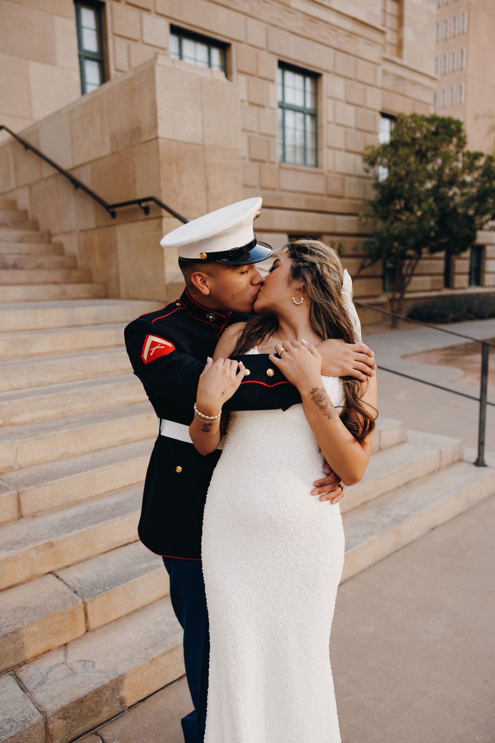 A beautiful kiss on a special day for this newly married couple.