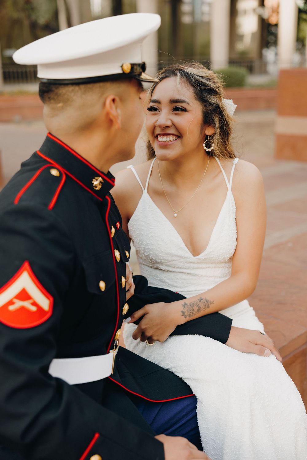 Gazing into her husbands eyes during their bridal sessino.