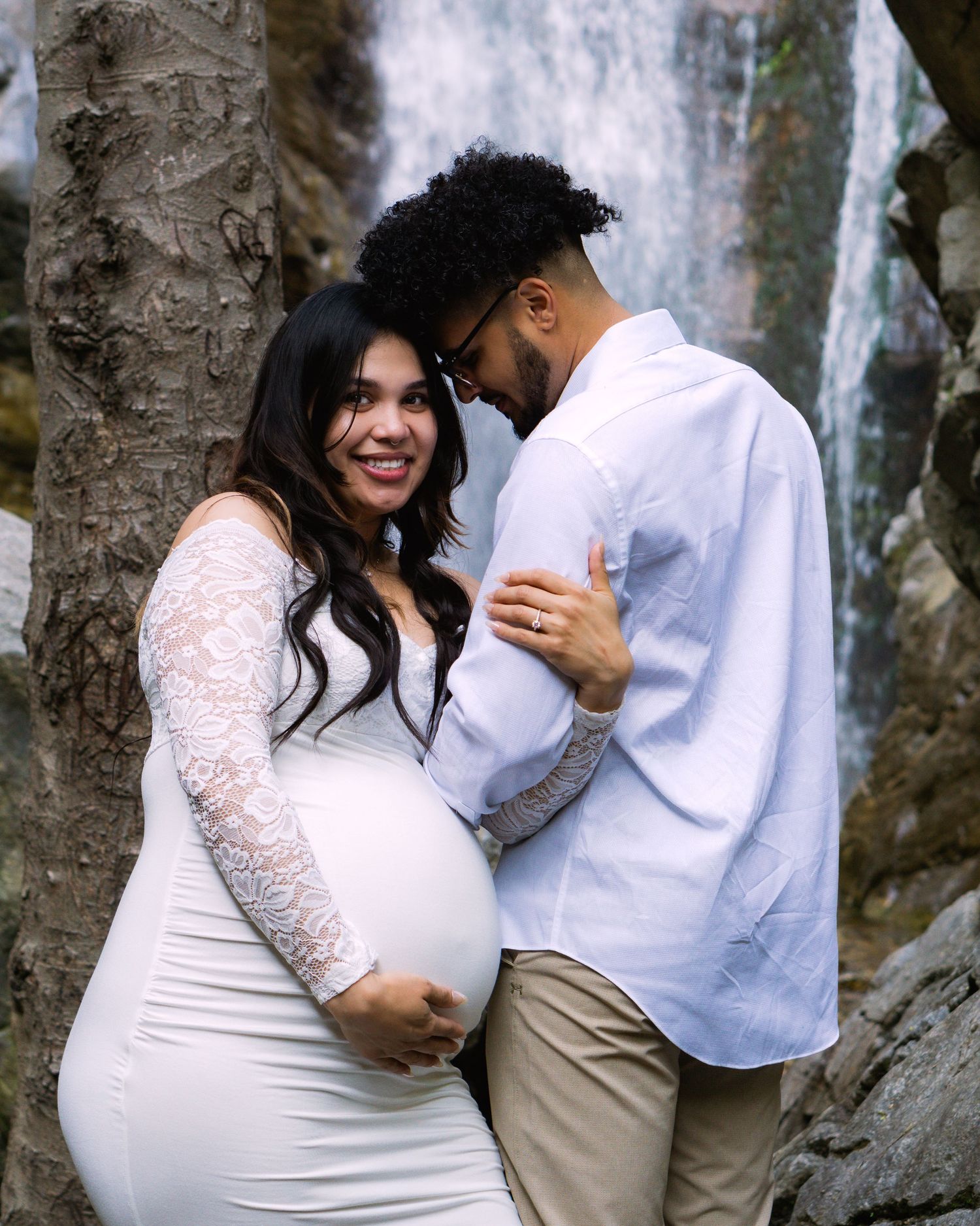 maternity photo at a waterfall