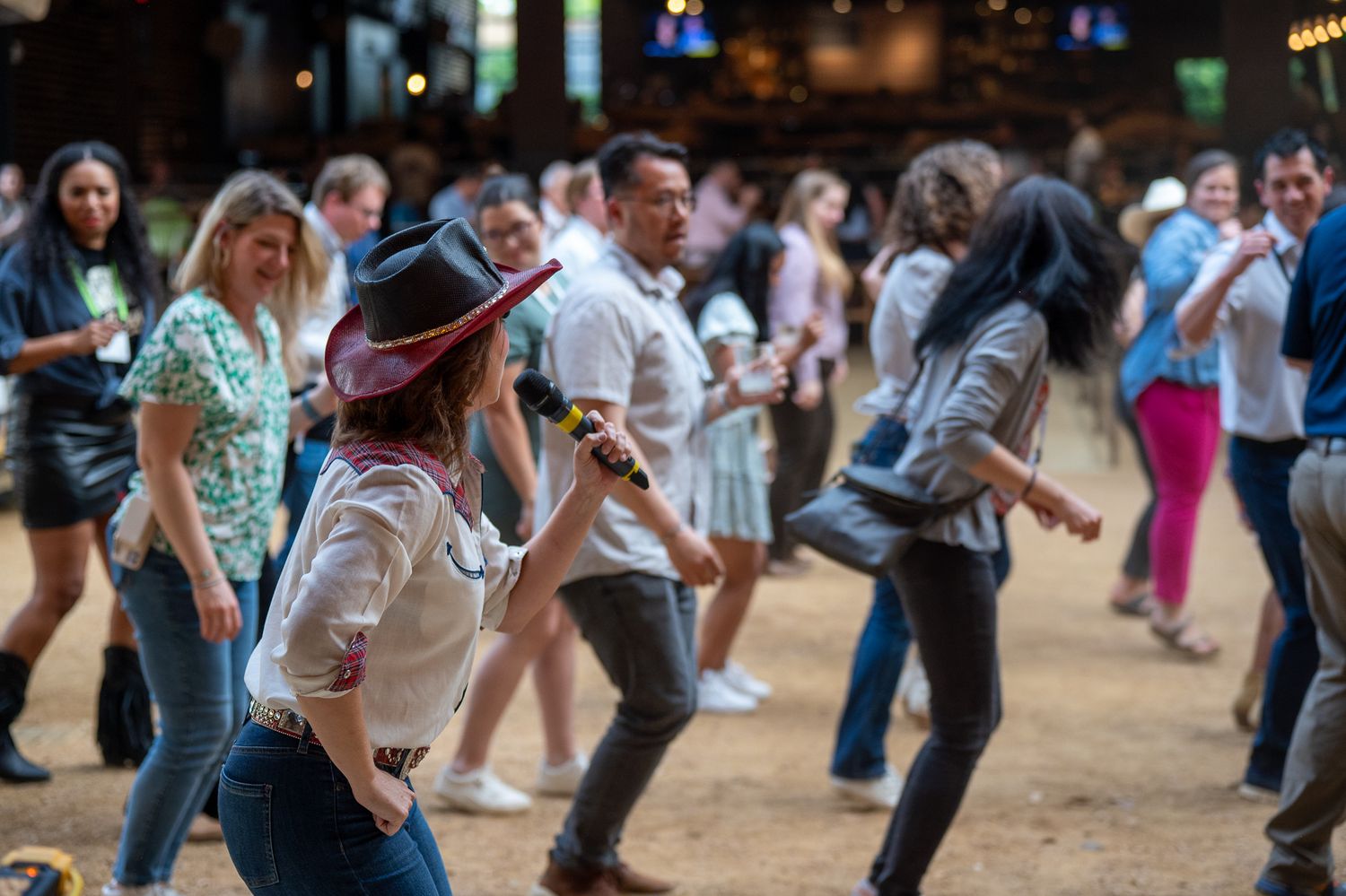 Dancers performing a Texas line dance in Houston, TX.