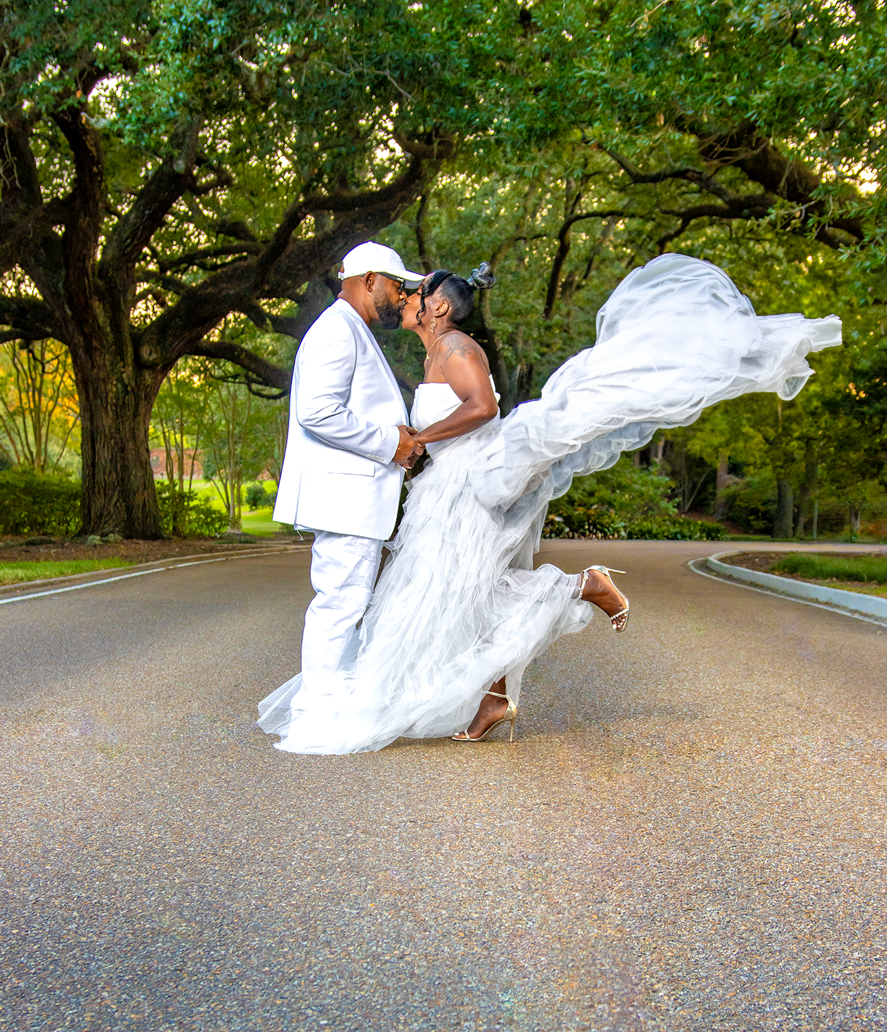 Dynamic wedding photo sequence showing flowing dress movement on a paved path.