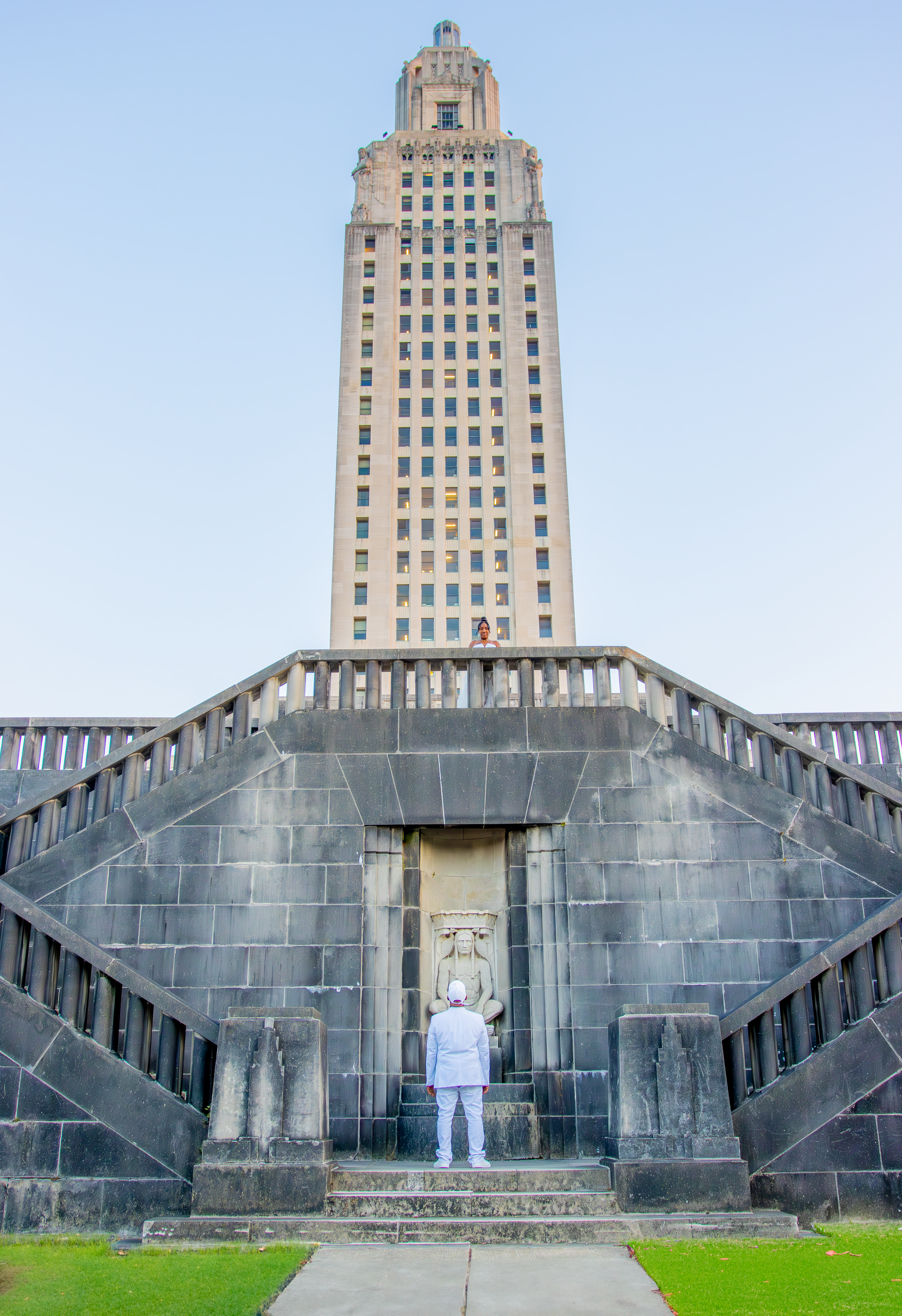 Art deco style government building with symmetrical stone steps and architecture.