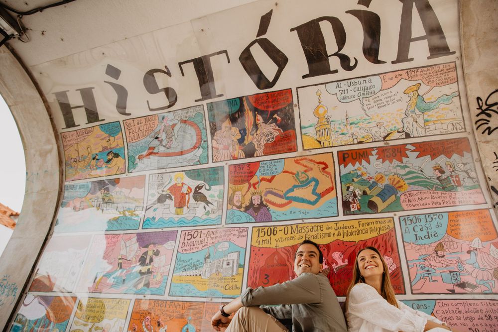 Vintage comic book panels displayed on a wall showing colorful retro artwork and text.