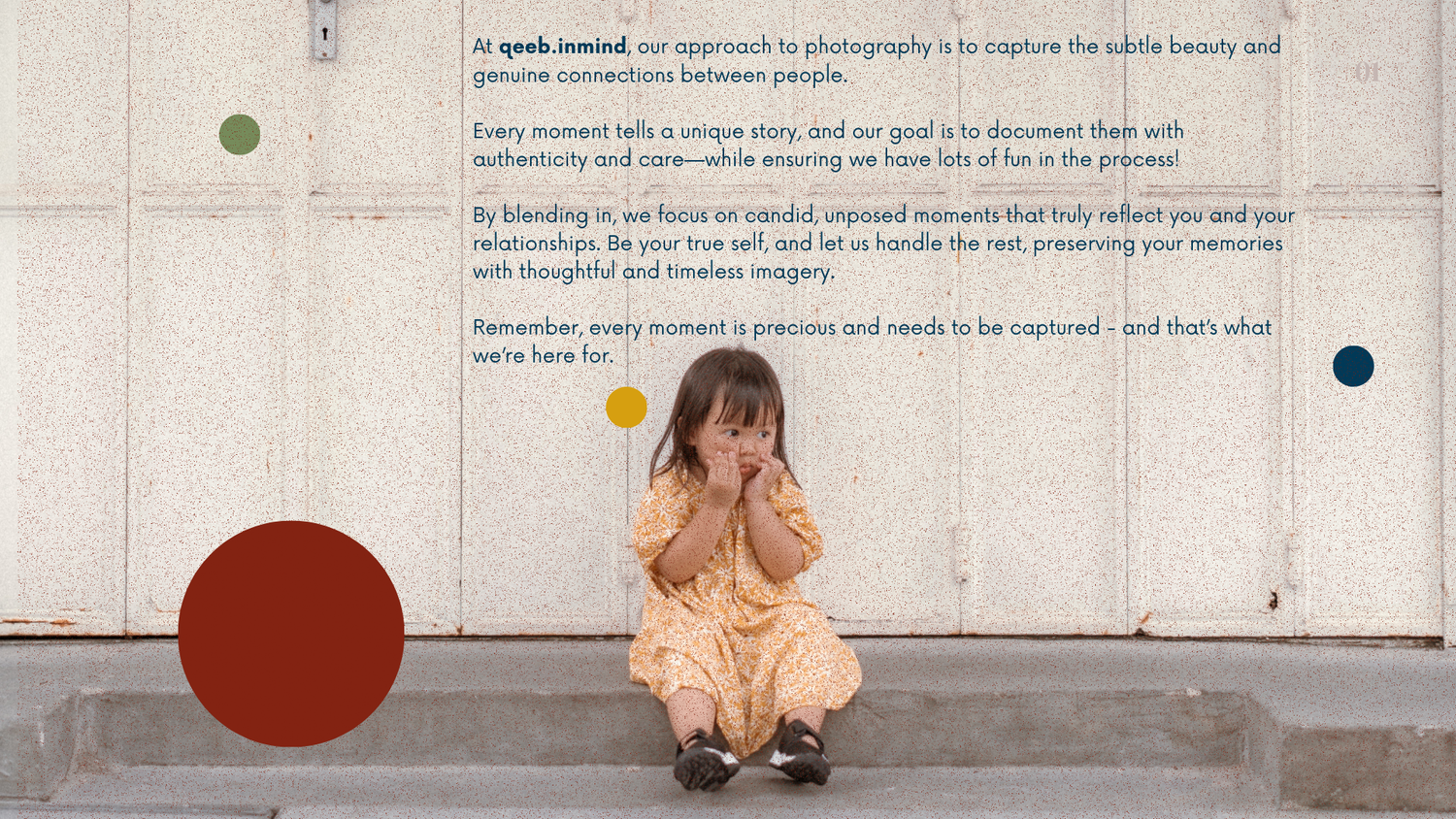 Small figure crouched against white wall with colorful geometric shapes.