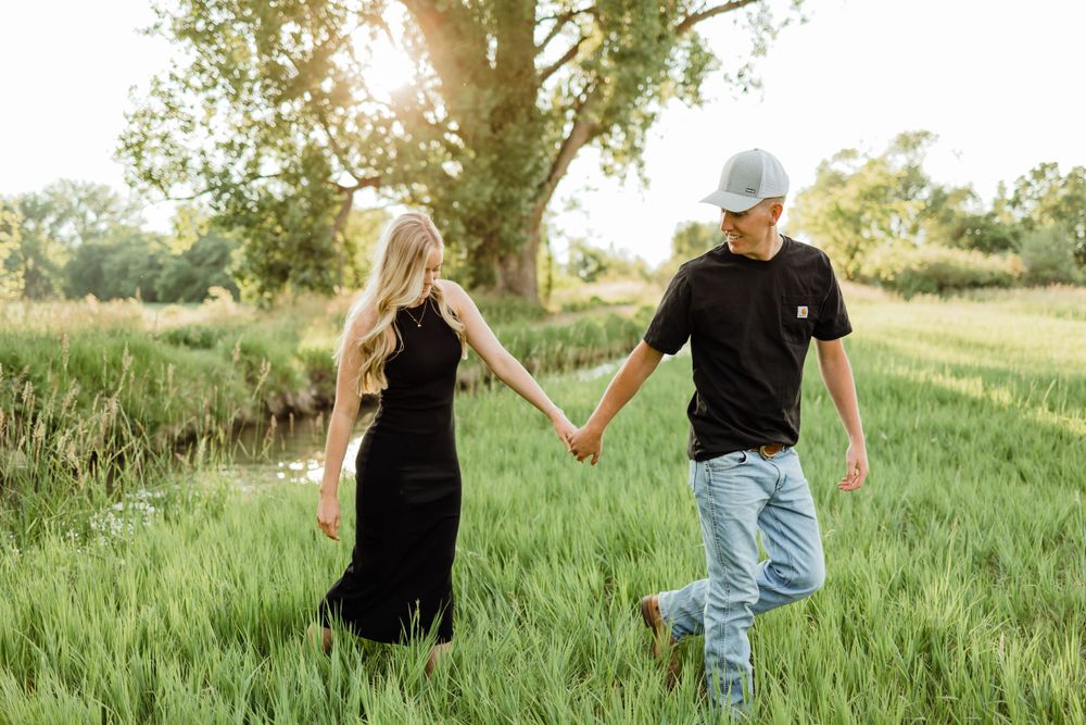 Logan Utah Engagement Near Tree and Stream