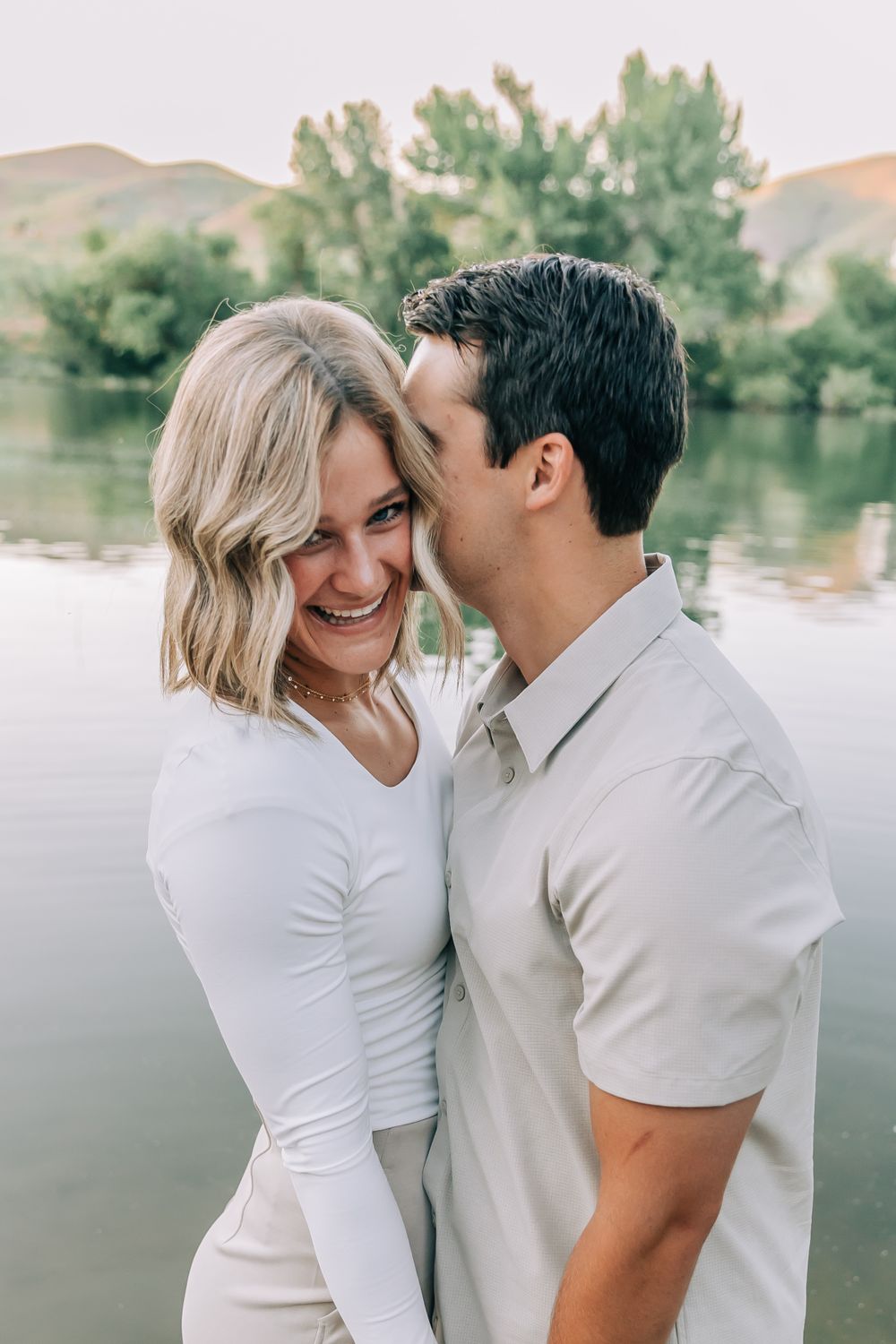 Affectionate Engaged Couple By Lake