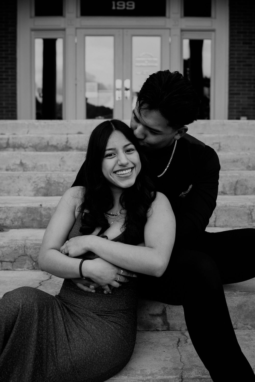 Young Prom Couple Embracing on Stairs