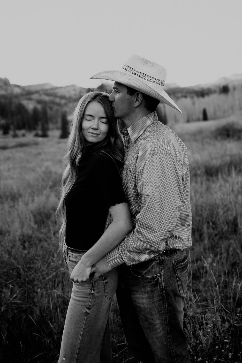 Western Couple with Cowboy Hat in Black and White