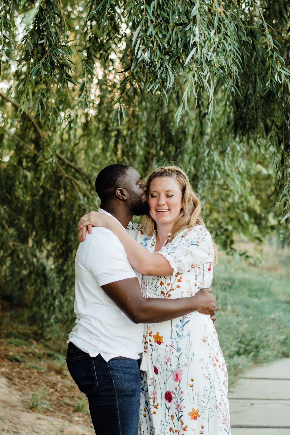 Diverse Couple Underneath Tree