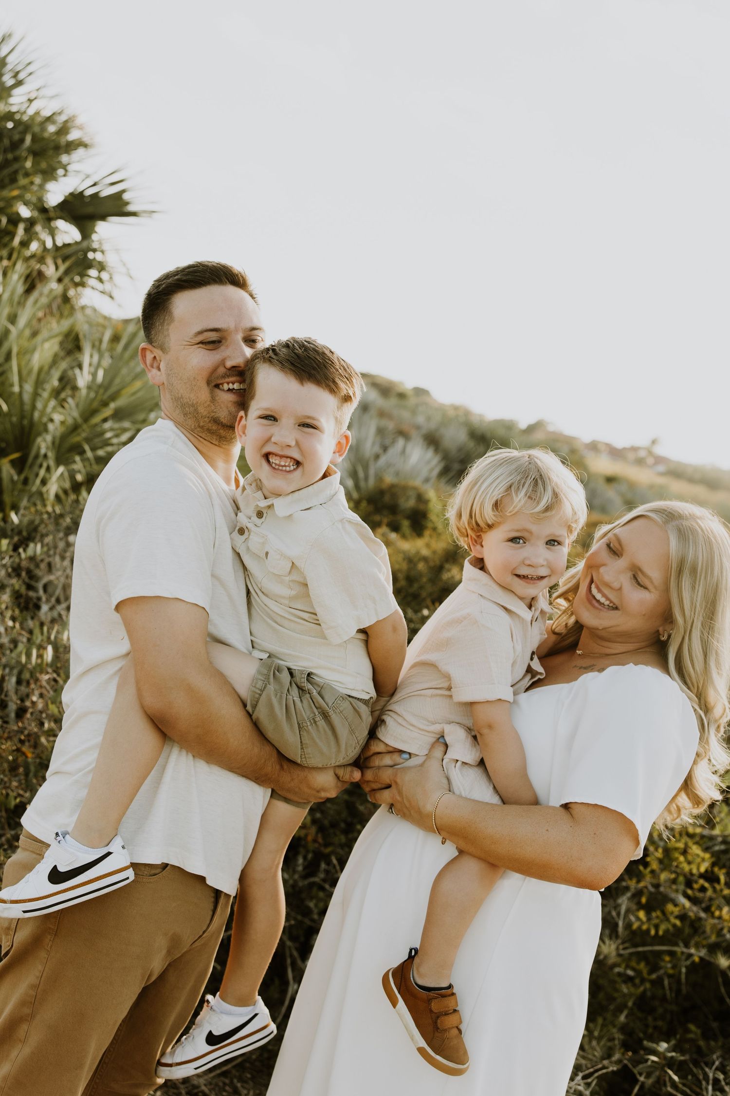 Extended family photos at the beach and Clock Tower in Palm Beach, Florida captured by Lindsay McDow Photography. Worth Ave on the island