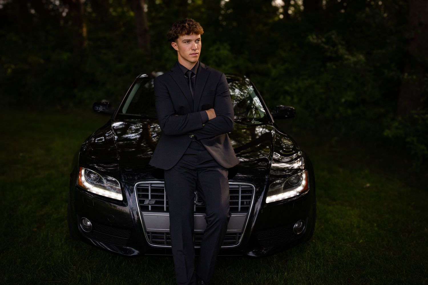 a young man in a black tux, Family lifestyle session in Alberta by Creation Photography