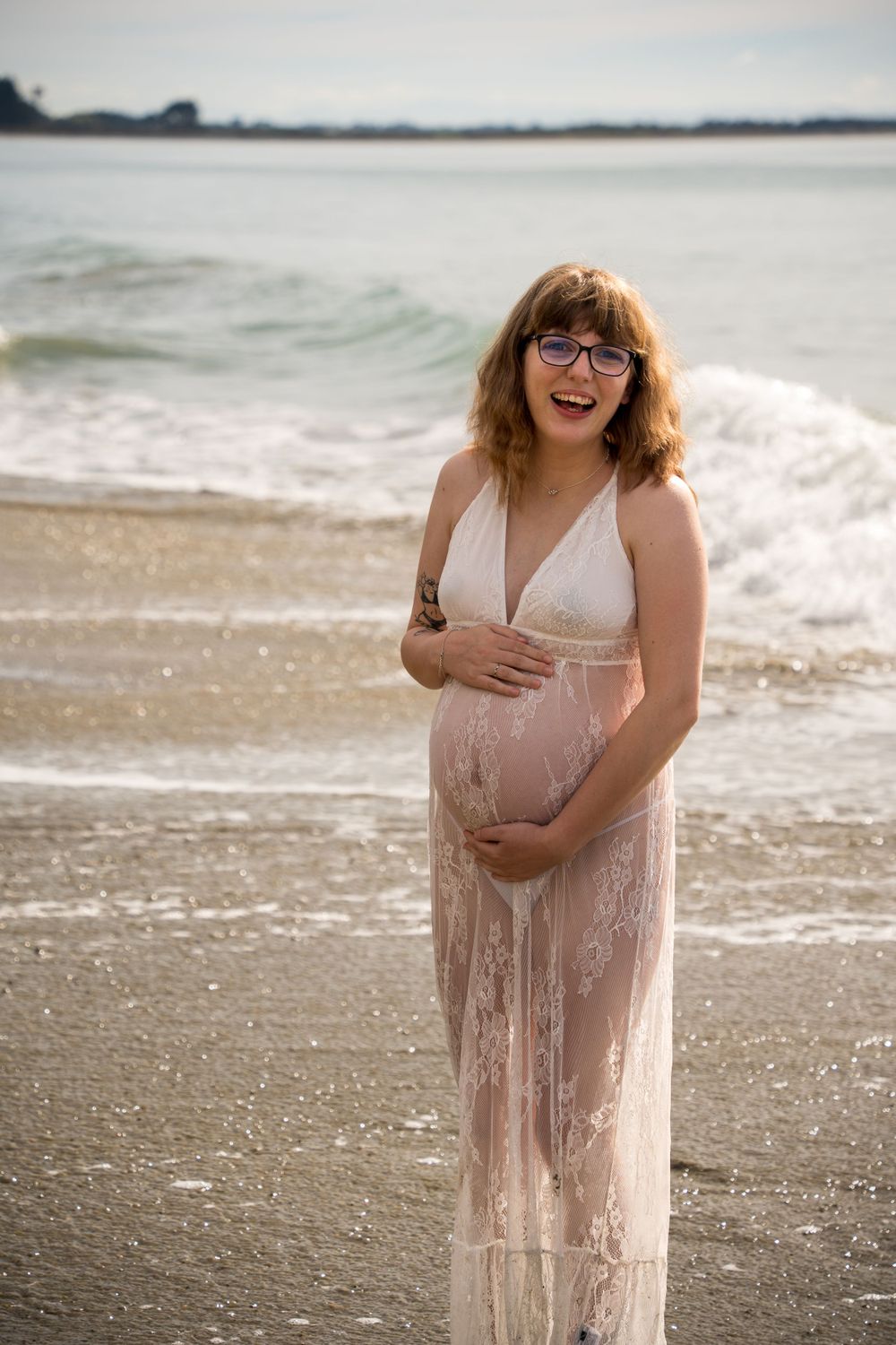 maternity photoshoot in lace gown at Riverton beach