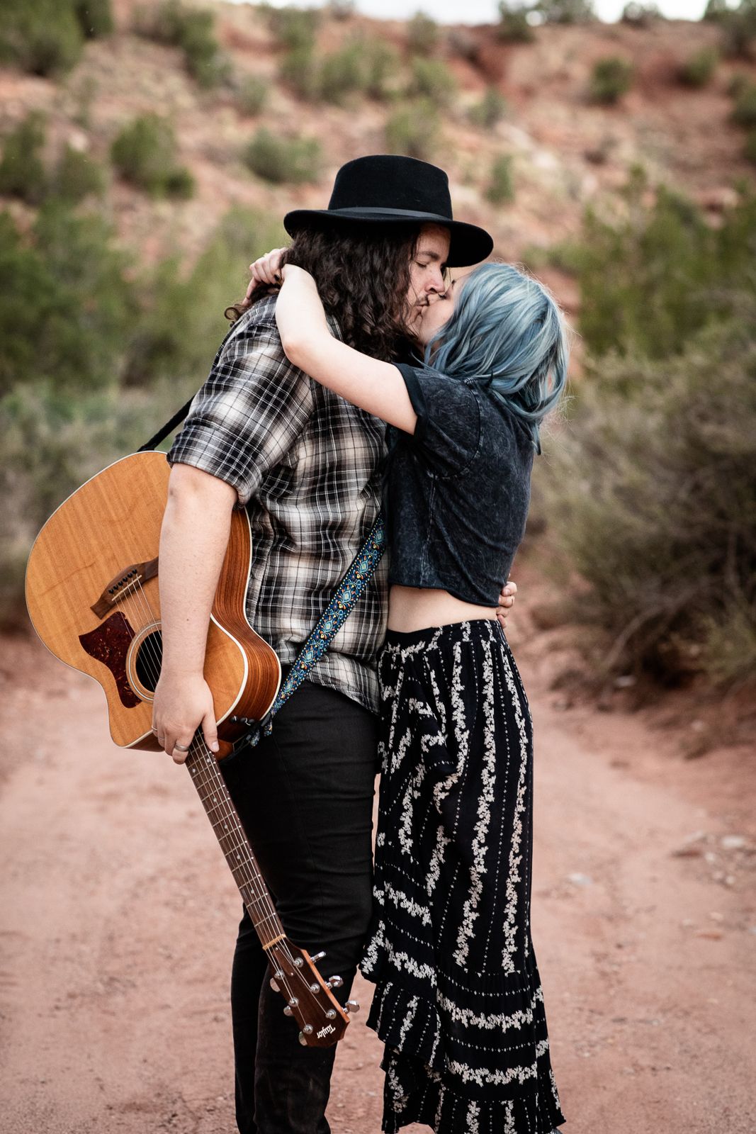 Beautiful outdoor engagement photography; musician couple in New Mexico landscape; Clarissa Anello