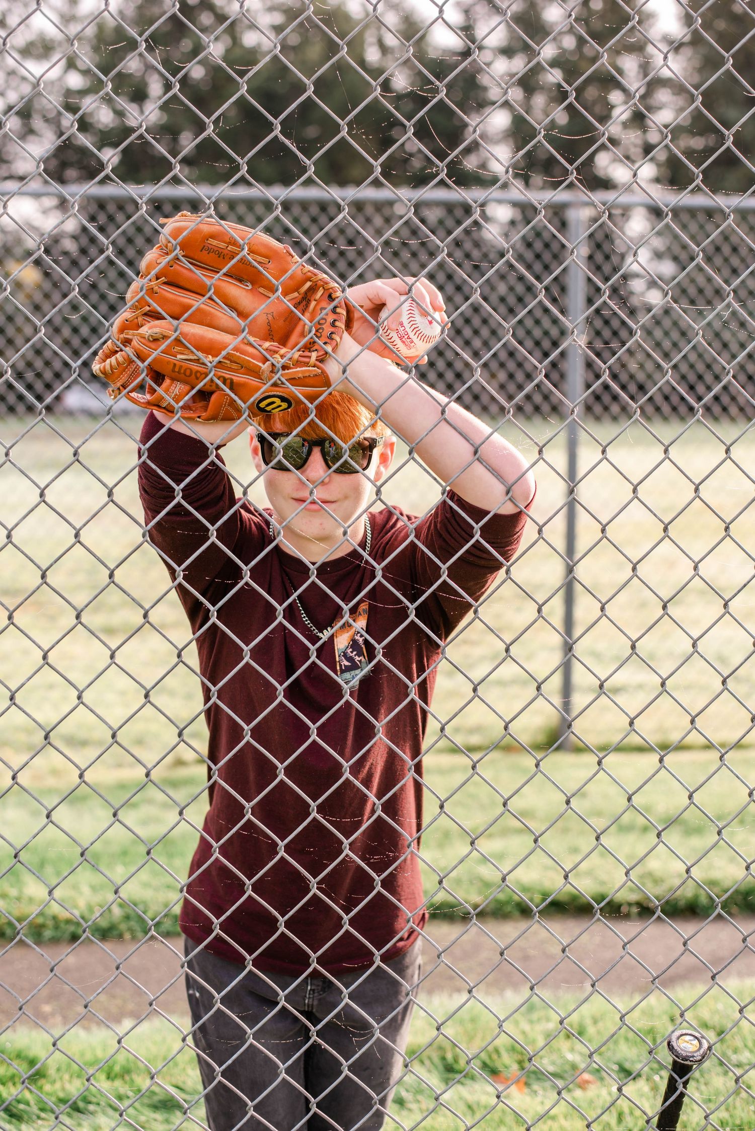 Baseball player senior guy portrait Fayetteville NC bright natural light