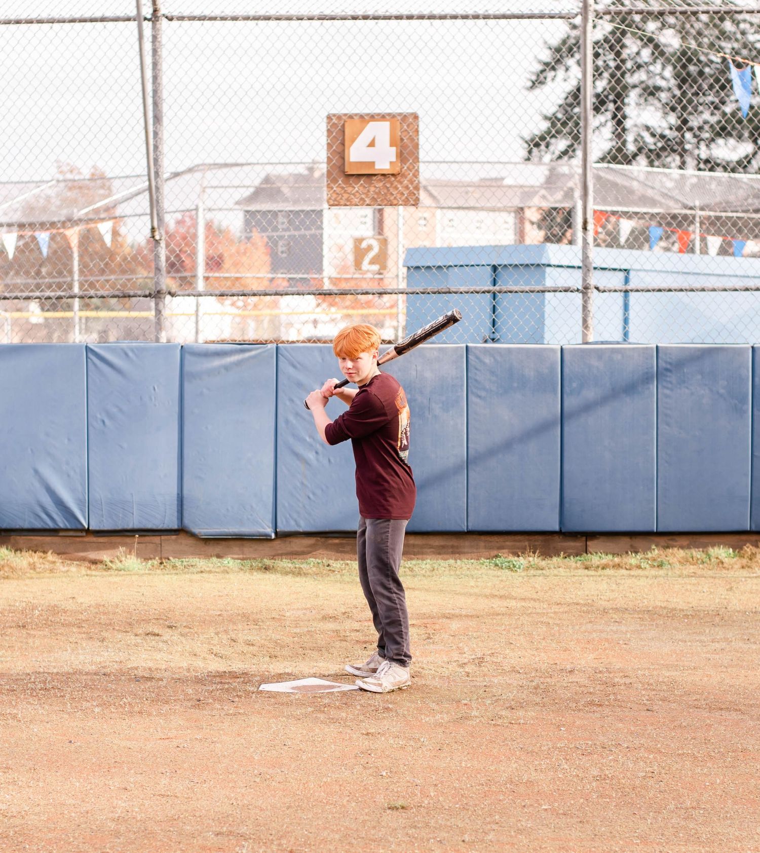 Baseball player senior guy portrait Fayetteville NC bright natural light