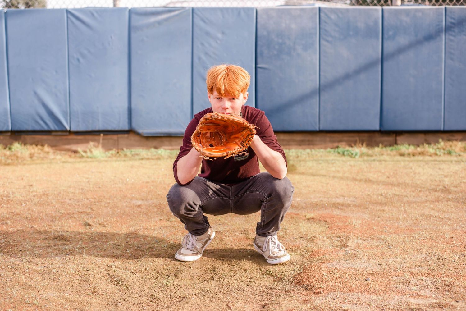 Baseball player senior guy portrait Fayetteville NC bright natural light