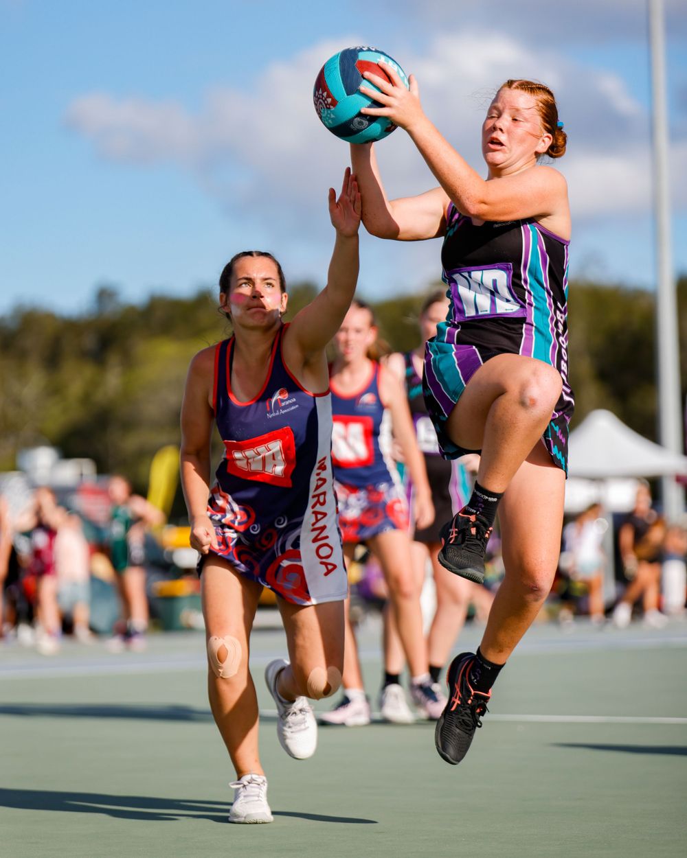 Netball sports action photo taken by Sunshine Coast Sports Photographer, Rachel Wright at Netball Qld State Cup