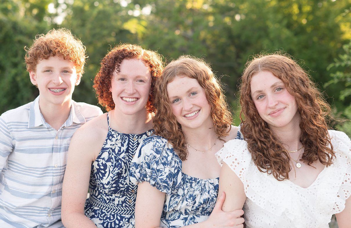Family of 6 Outdoor Field Summer Portraits by Bartlesville Photographer Kristi Bray Photography