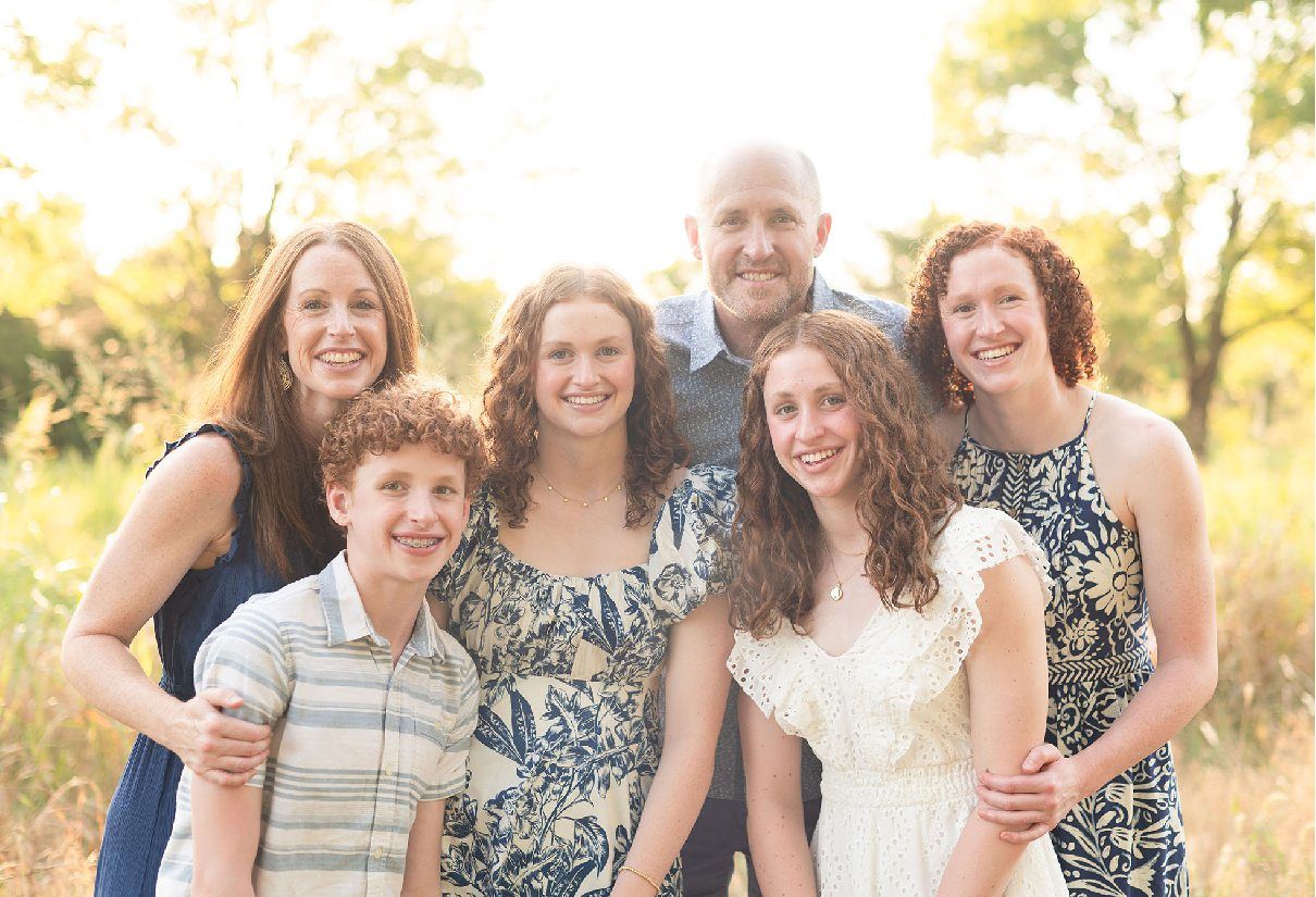 Family of 6 Outdoor Field Summer Portraits by Bartlesville Photographer Kristi Bray Photography