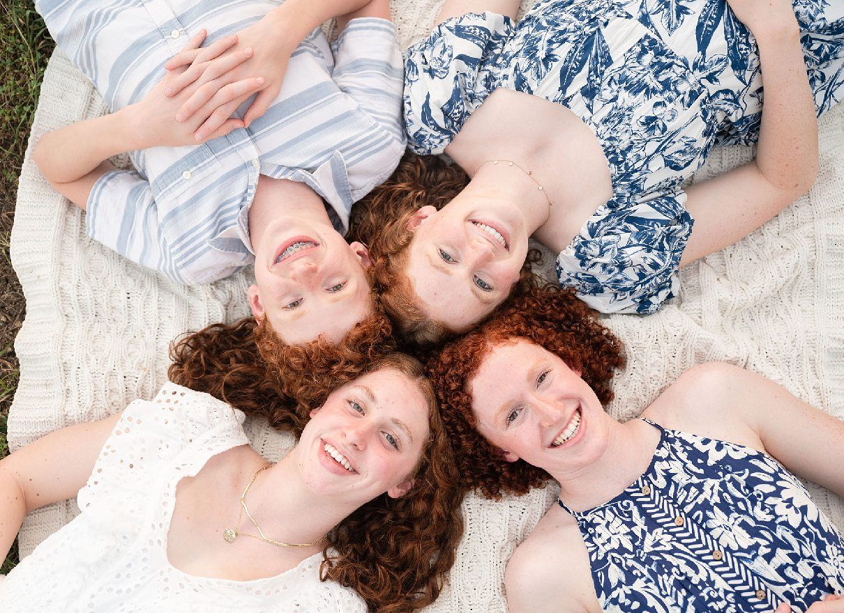 Family of 6 Outdoor Field Summer Portraits by Bartlesville Photographer Kristi Bray Photography