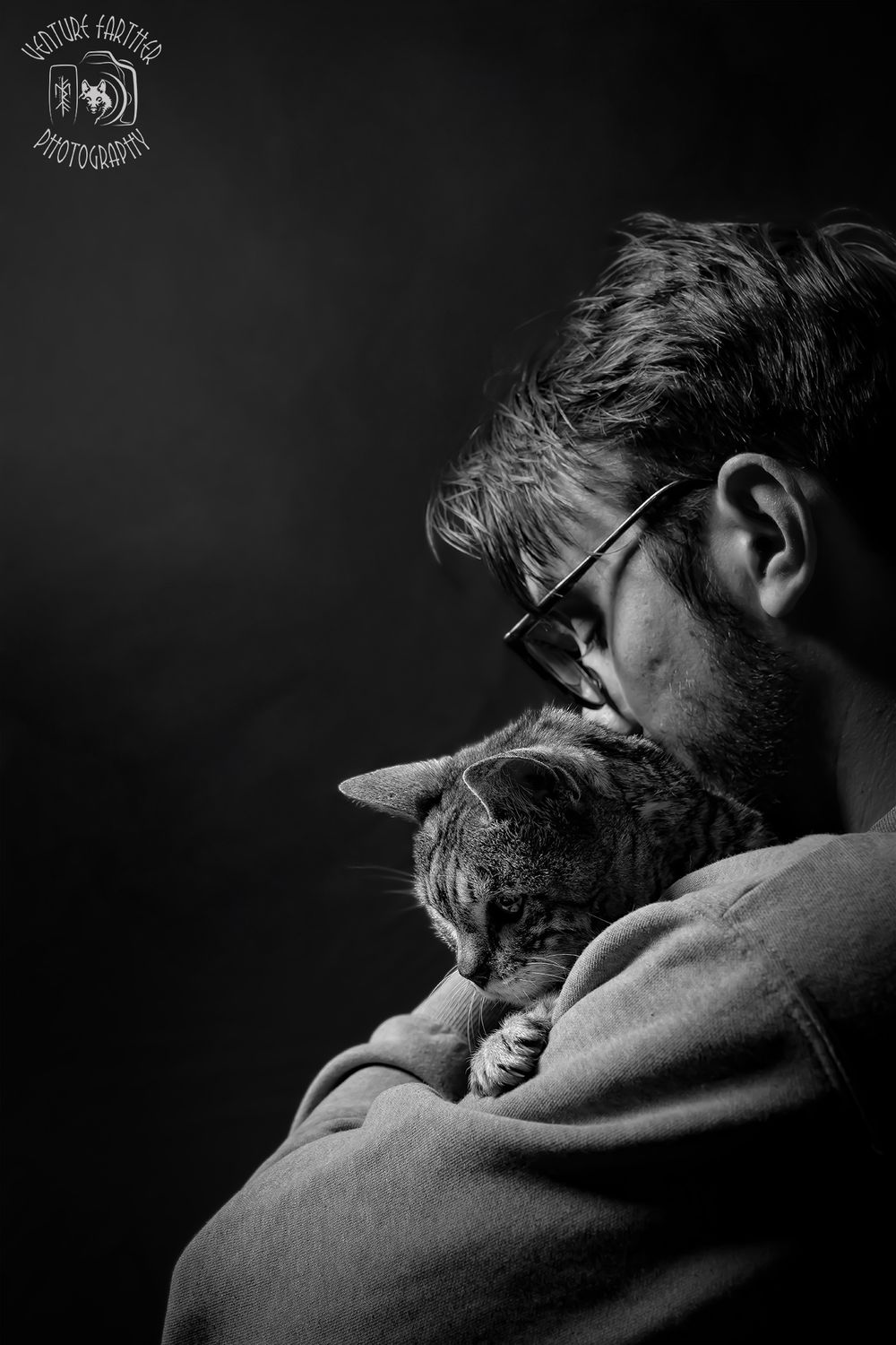 A black and white photo series shows a cat snuggling against someone's neck and shoulder in an intimate portrait.