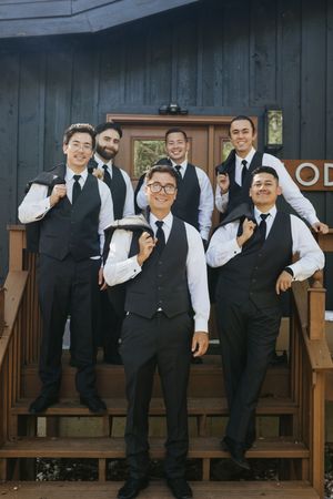 Groom and groomsmen getting ready during the wedding day.
