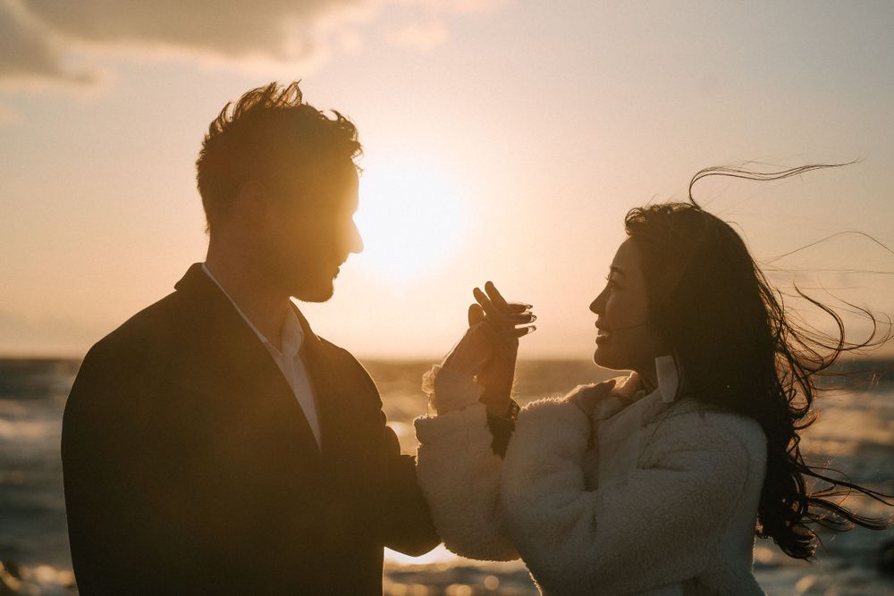 Couple elopement at the beach in Seattle during sunset